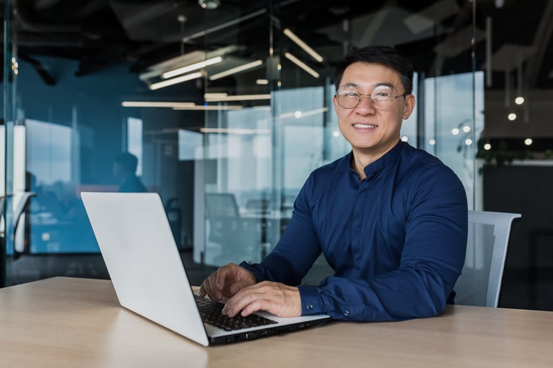 Male employee working on computer